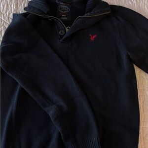 American Eagle Outfitters Dark Blue Zip-Up Sweater with Red Emblem